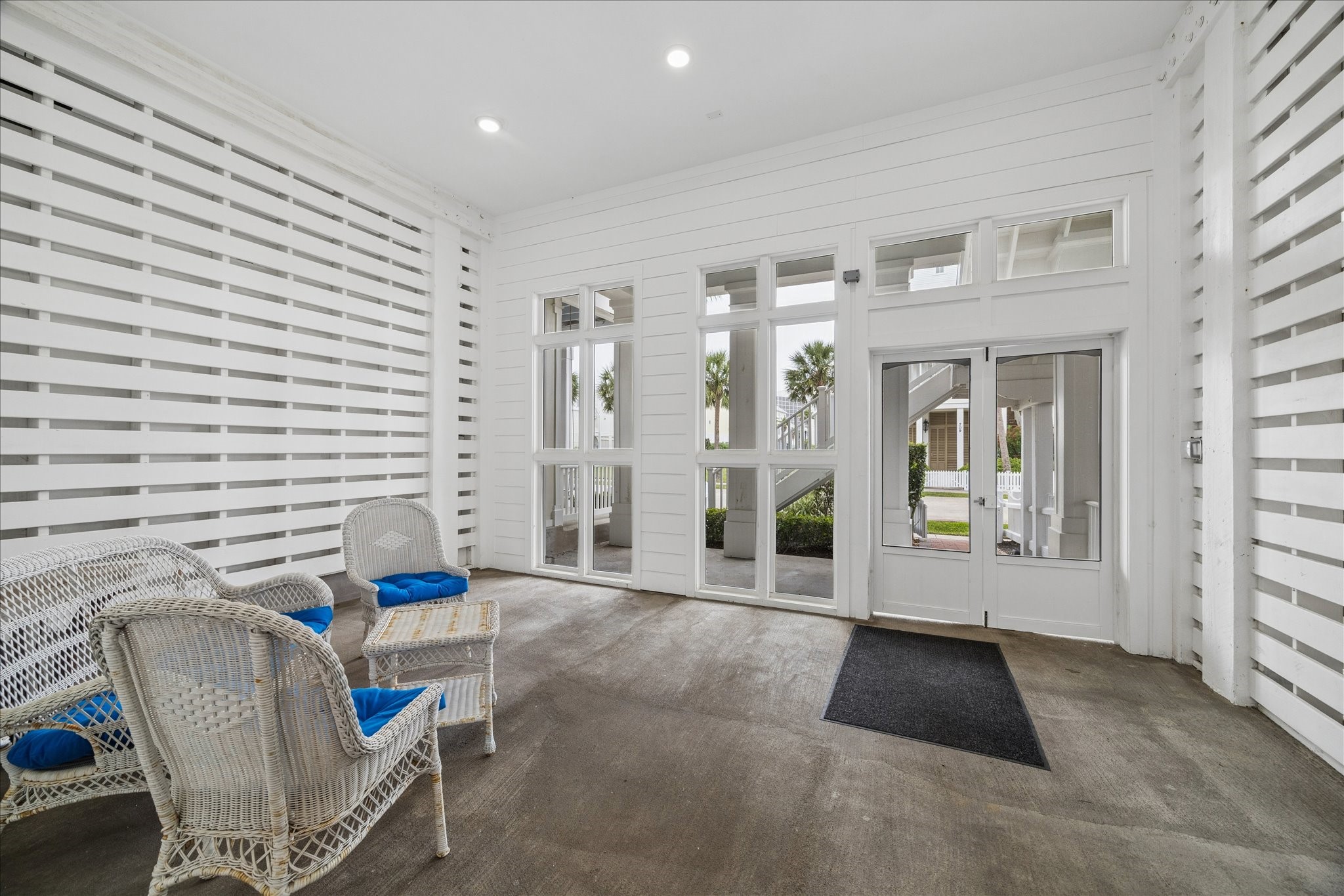 710 Positano Road Galveston, TX 77550 - Photo 26 of 36 The spacious screened in outdoor patio is located on the first floor.