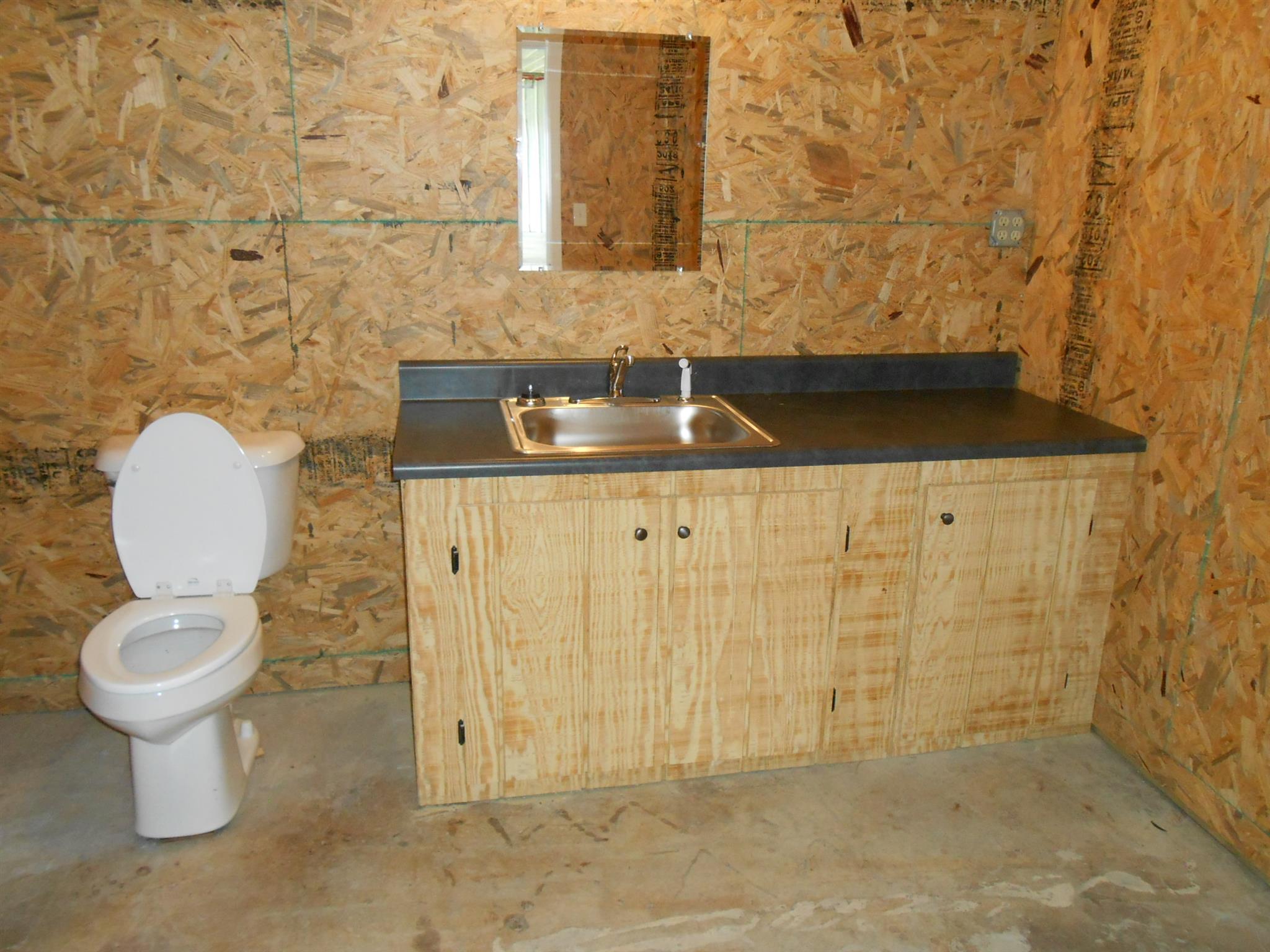 283 Freeland Road Portland, TN 37148 - Photo 18 of 21 a bathroom with a sink and a toilet