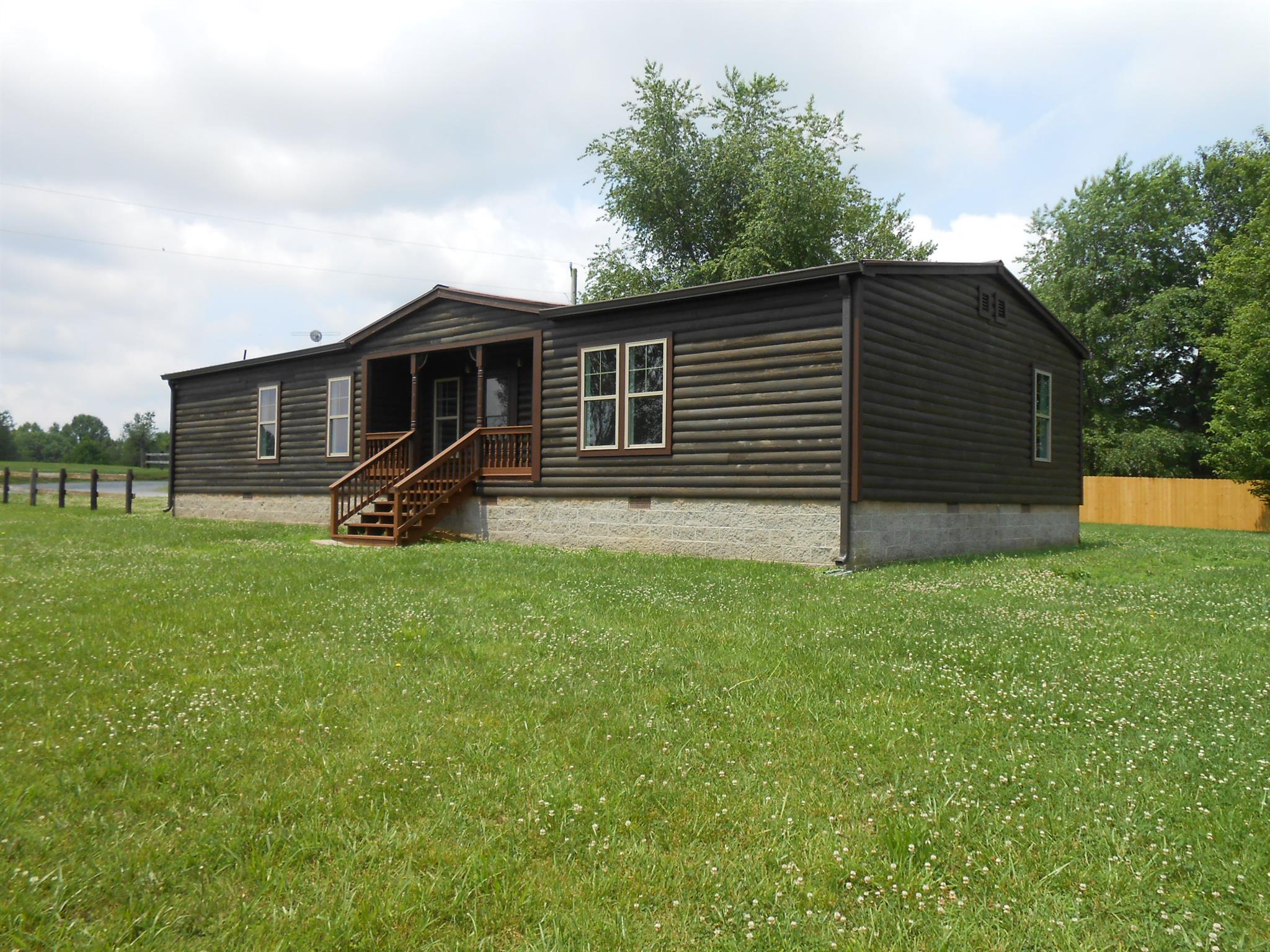 283 Freeland Road Portland, TN 37148 - Photo 3 of 21 a front view of house with yard and green space