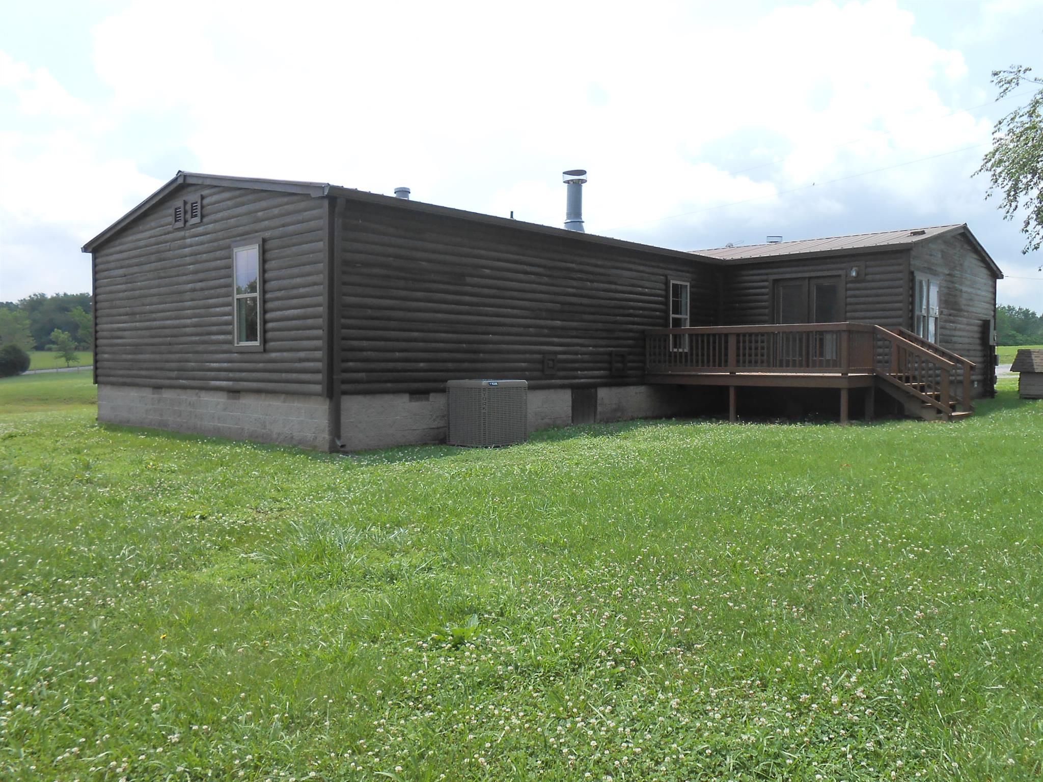 283 Freeland Road Portland, TN 37148 - Photo 4 of 21 a backyard of a house with lots of green space