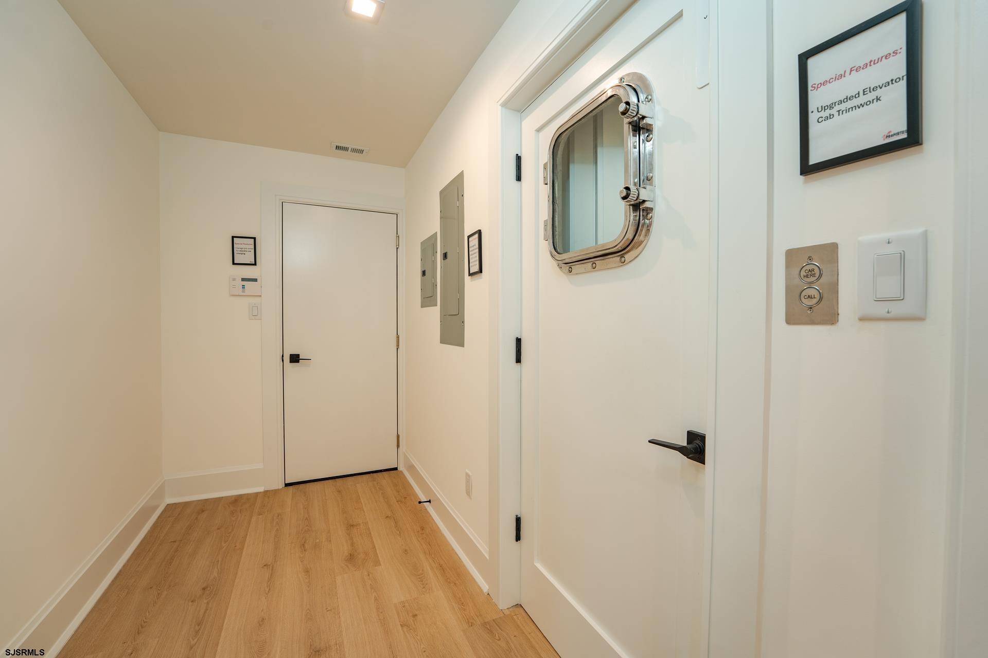 27 Spruce Road Ocean City, NJ 08226 - Photo 27 of 92 a view of a hallway with wooden floor and entryway