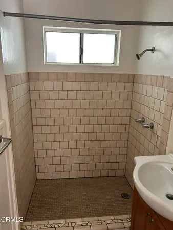 a bathroom with a sink a toilet