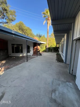 a view of lobby with furniture and chandelier