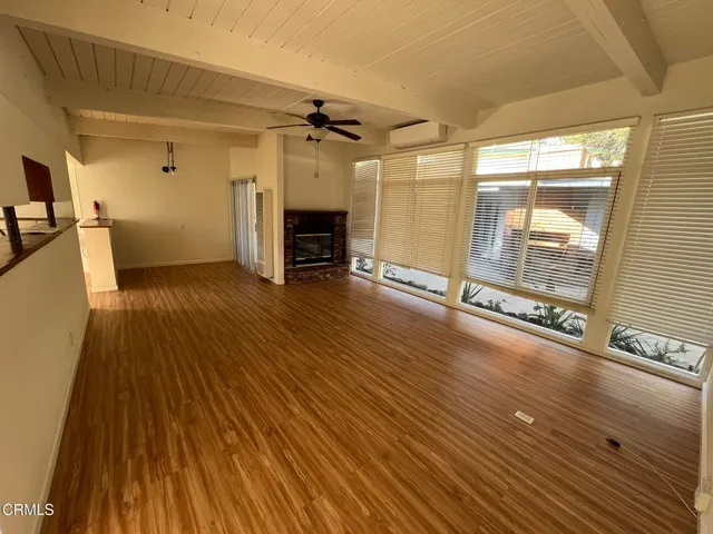 a view of a livingroom with a furniture