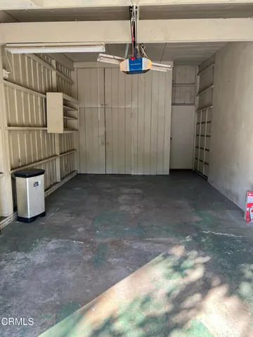a view of a room with wooden walls