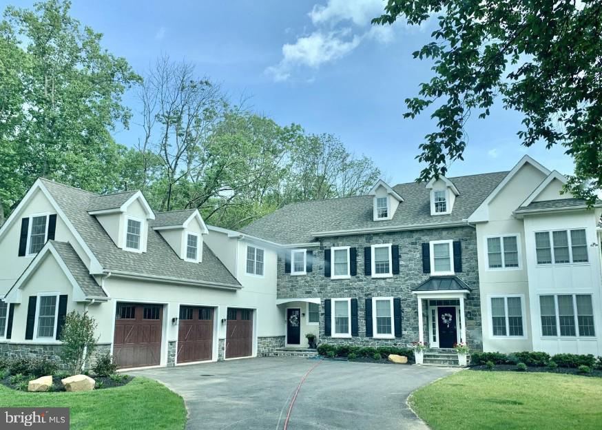1304 Sugartown Road Berwyn, PA 19312 - Photo 2 of 2 front view of a brick house with a yard