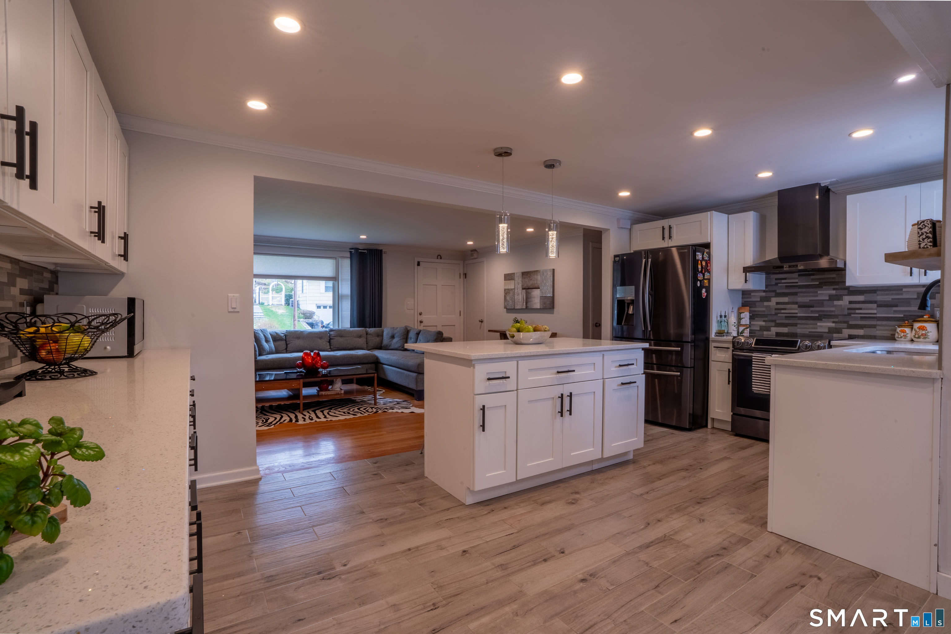 9 Cobblers Lane Norwalk, CT 06851 - Photo 15 of 29 a kitchen with a sink stainless steel appliances and cabinets