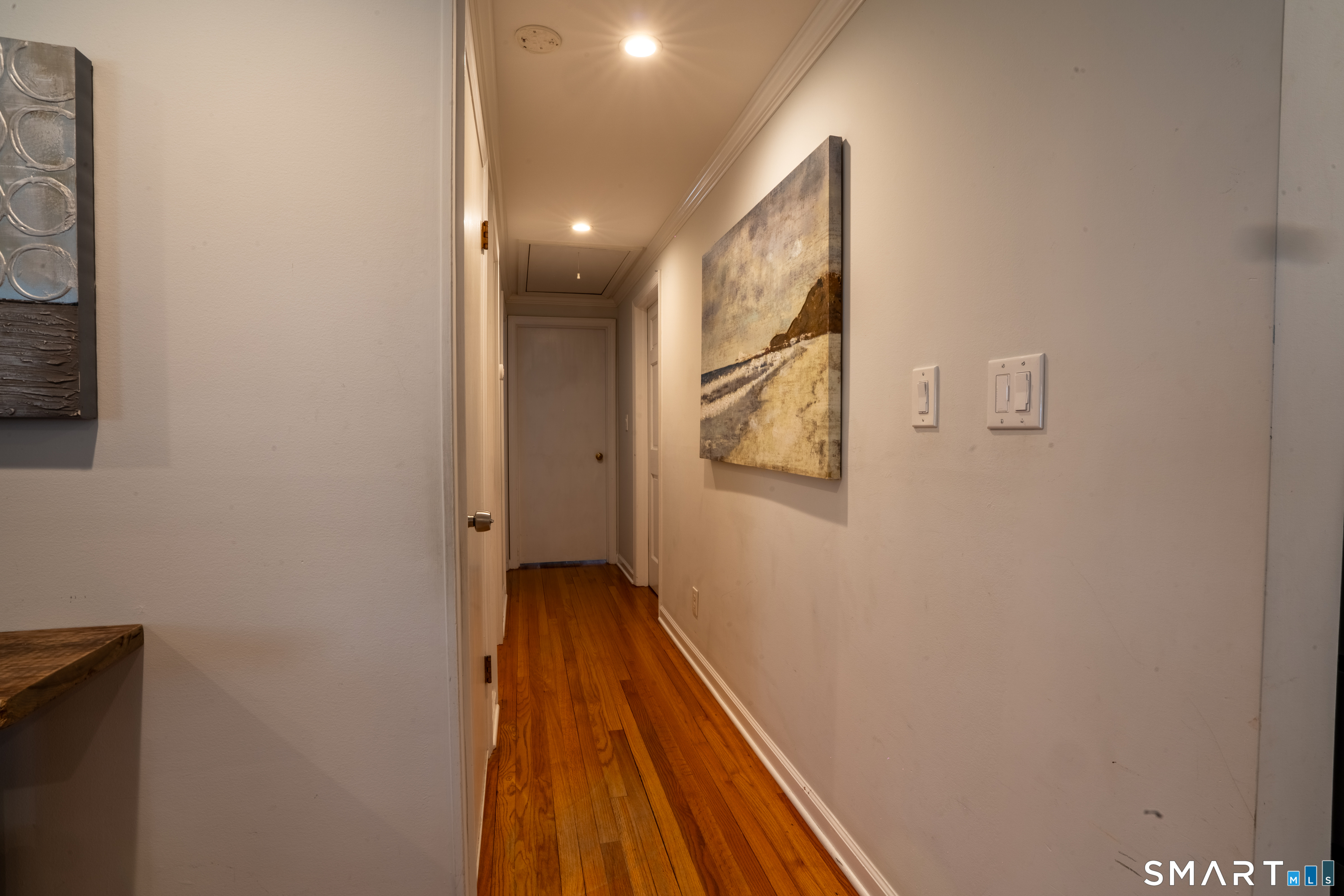 9 Cobblers Lane Norwalk, CT 06851 - Photo 16 of 29 a view of a hallway with wooden floor