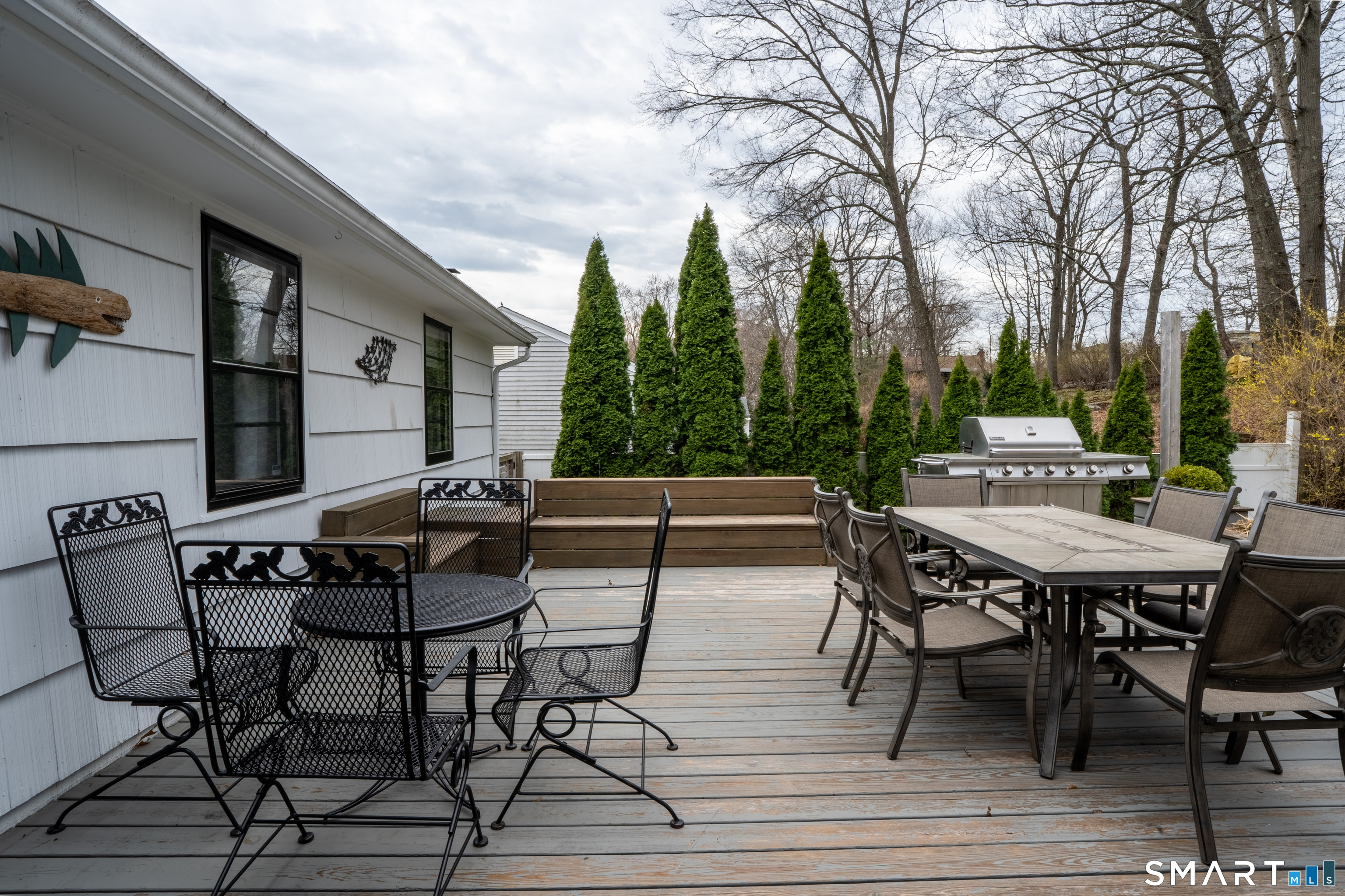 9 Cobblers Lane Norwalk, CT 06851 - Photo 24 of 29 a view of a patio with table and chairs and couches