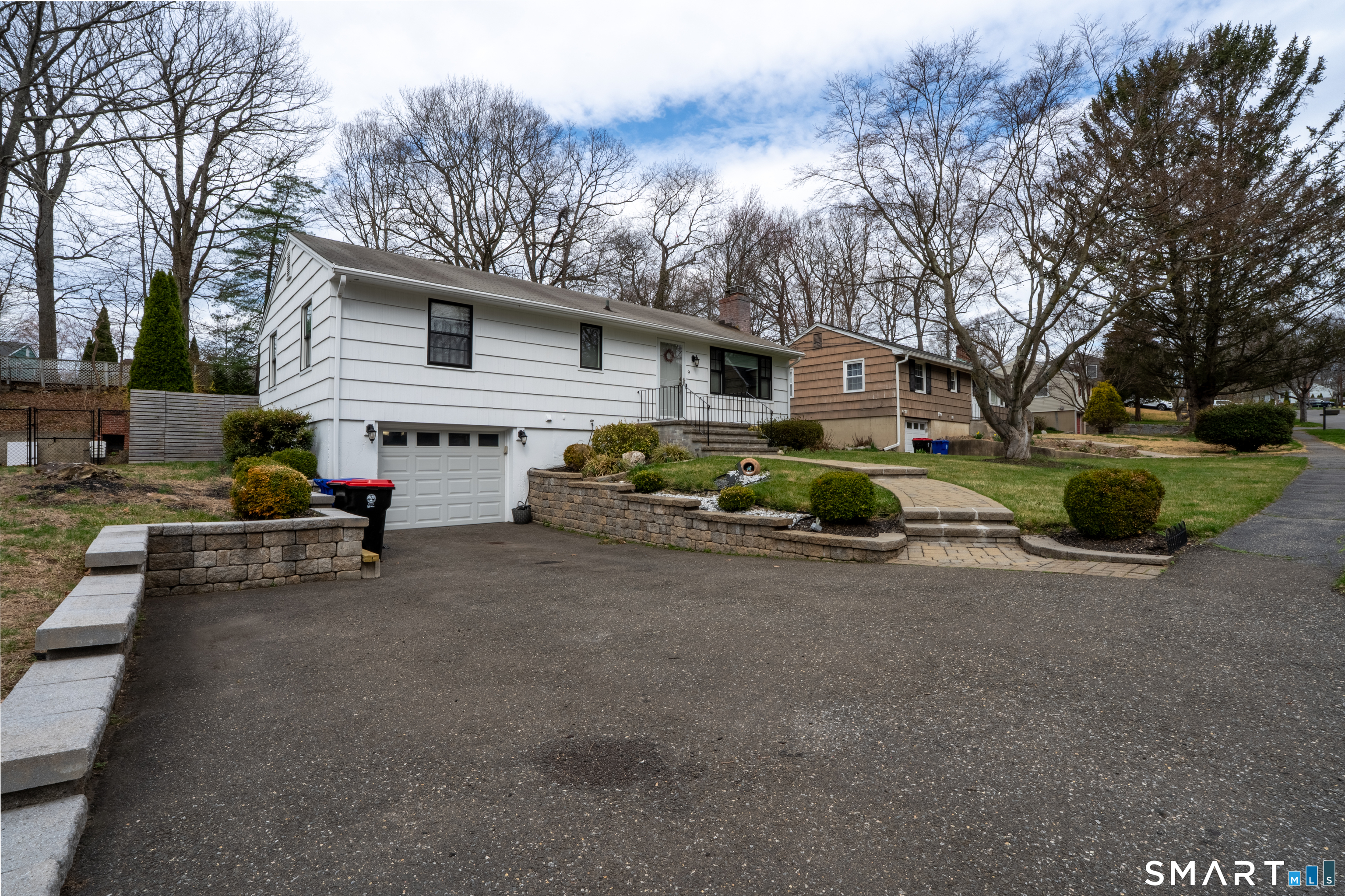 9 Cobblers Lane Norwalk, CT 06851 - Photo 3 of 29 a view of a house with a yard
