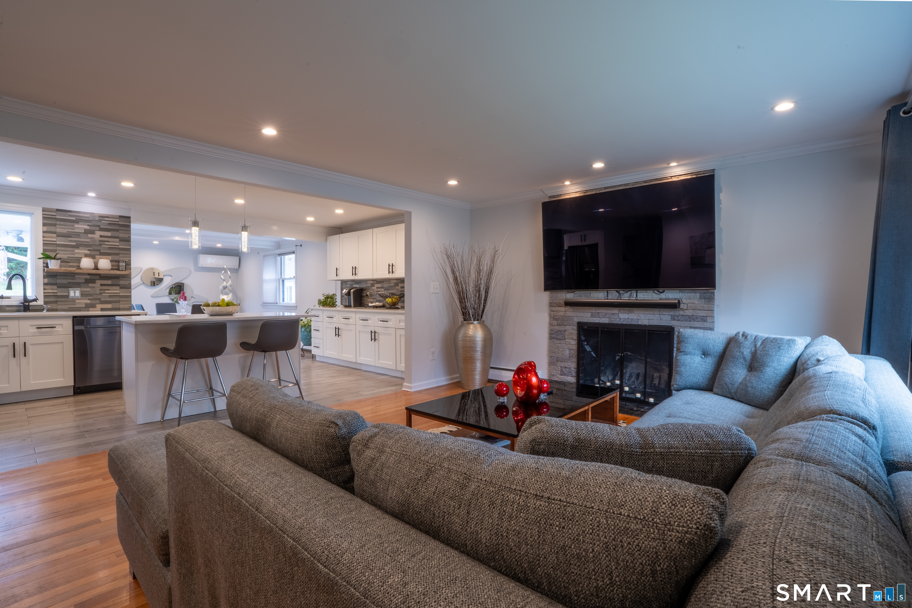 9 Cobblers Lane Norwalk, CT 06851 - Photo 7 of 29 a living room with furniture and a fireplace