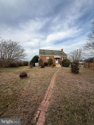 a view of car parked on road with building