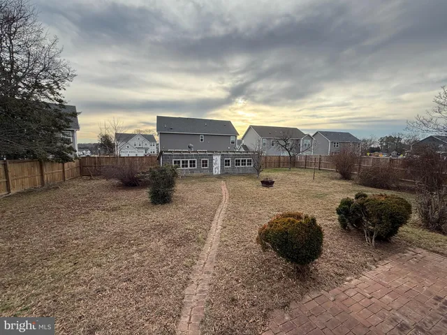 a view of a street with a building in the background