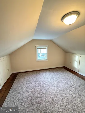 a view of a room with a window