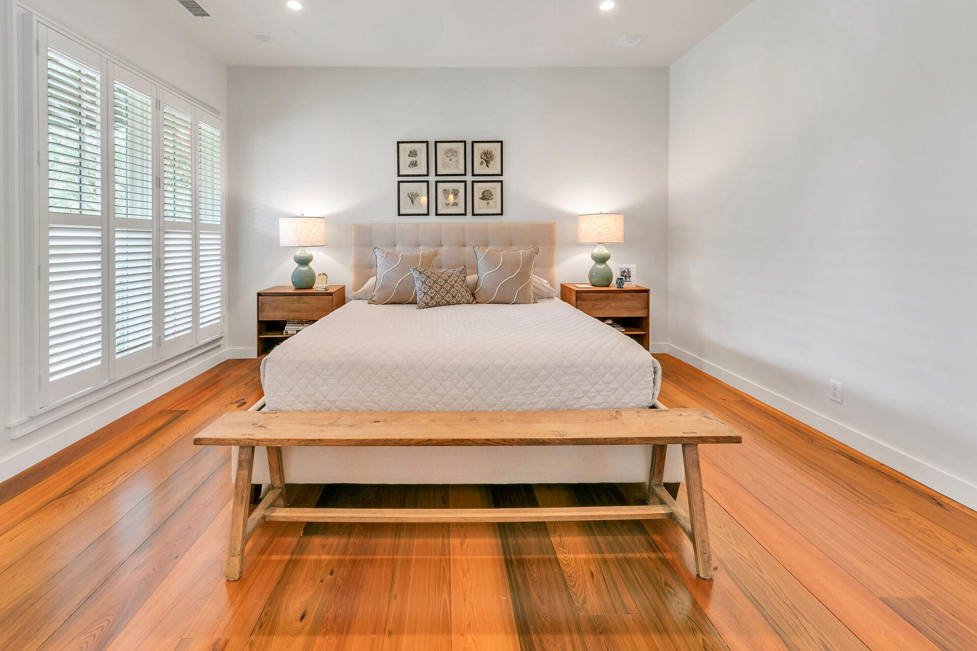 204 East Water Street Inlet Beach, FL 32461 - Photo 13 of 57 a bedroom with a bed and wooden floor