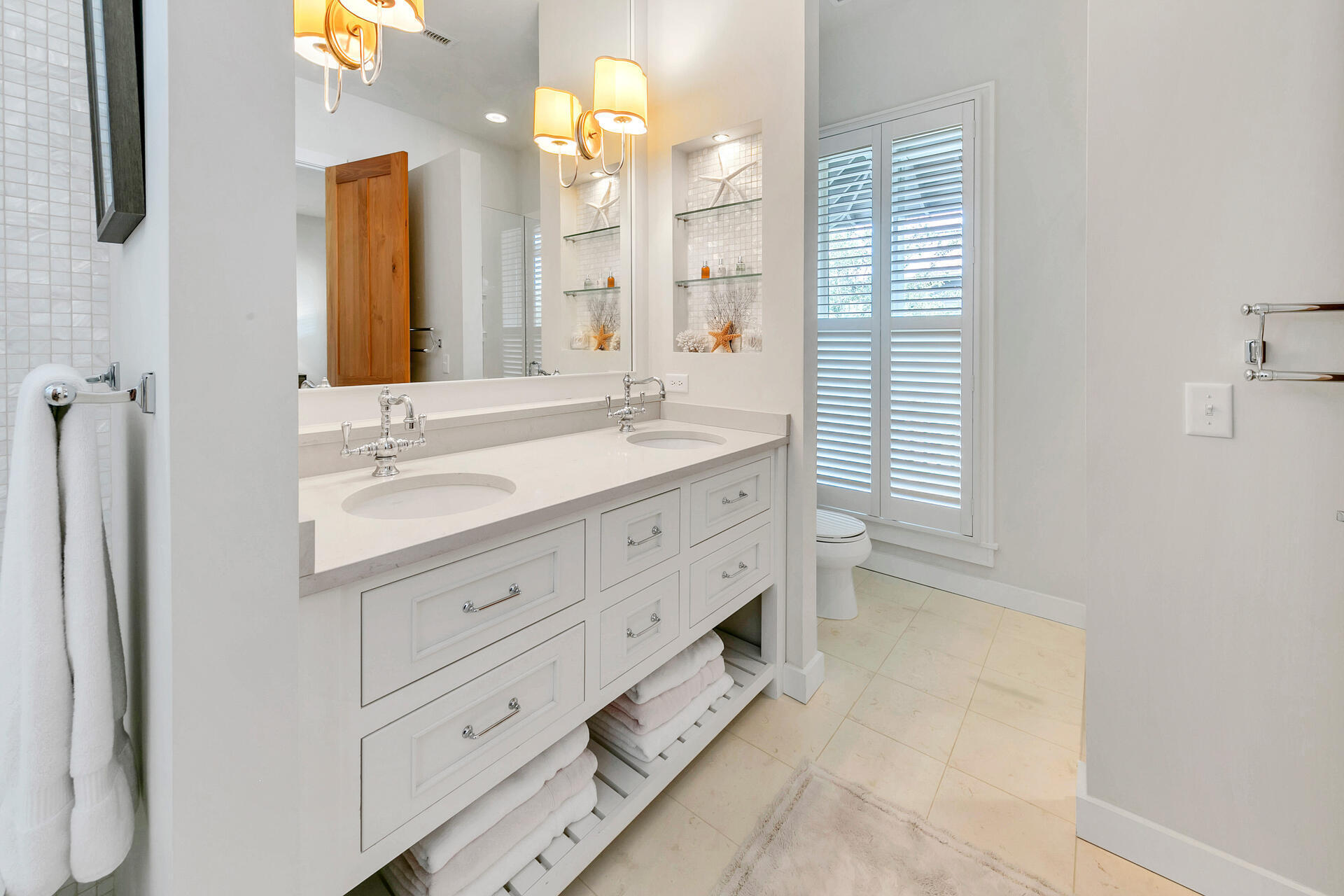 204 East Water Street Inlet Beach, FL 32461 - Photo 15 of 57 a bathroom with a double vanity sink mirror and double
