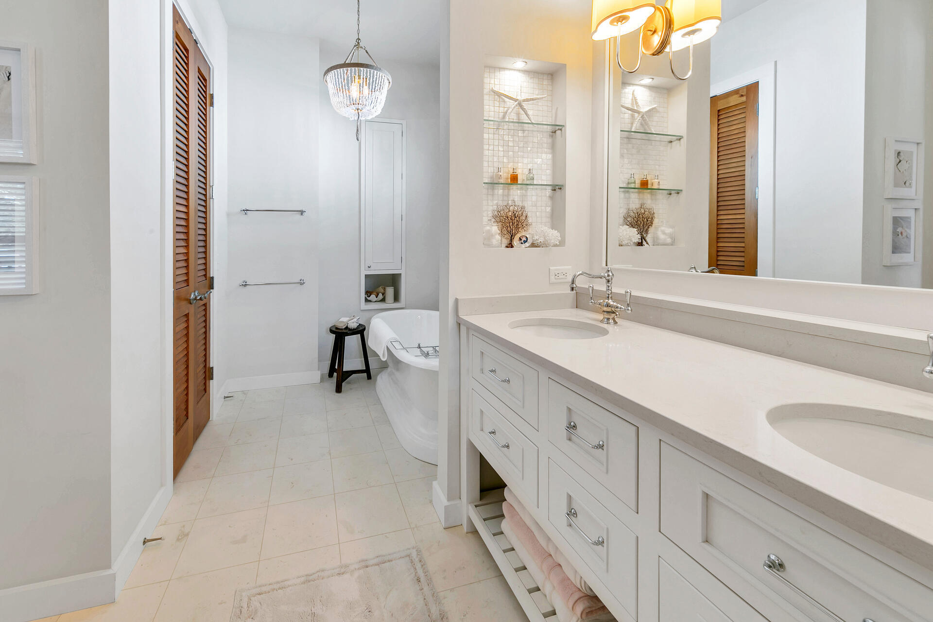204 East Water Street Inlet Beach, FL 32461 - Photo 17 of 57 a spacious bathroom with a sink double vanity and a mirror
