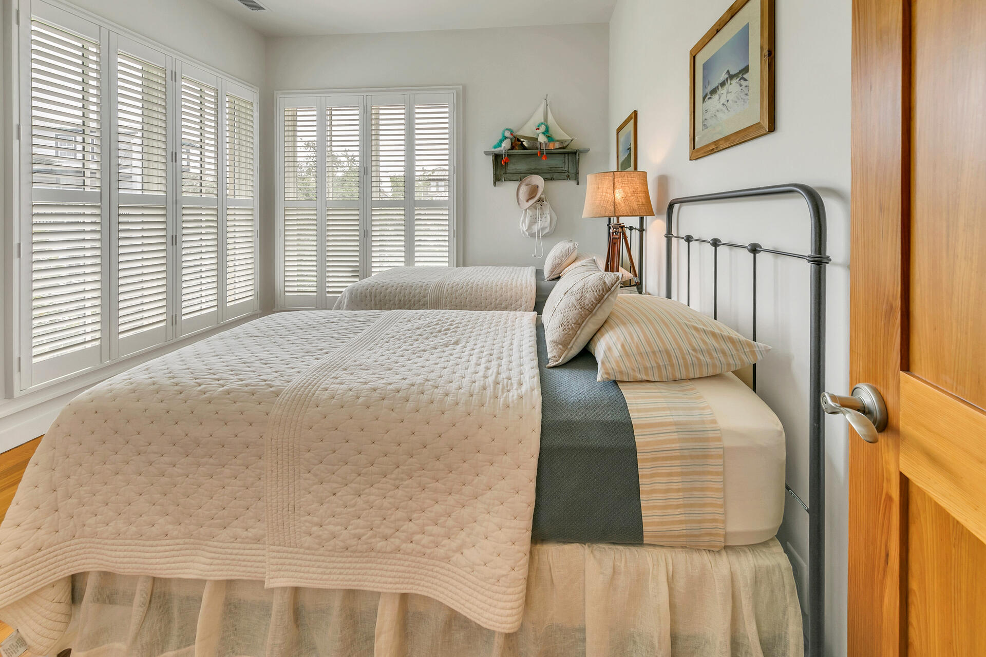204 East Water Street Inlet Beach, FL 32461 - Photo 21 of 57 a bedroom with a bed and a large window
