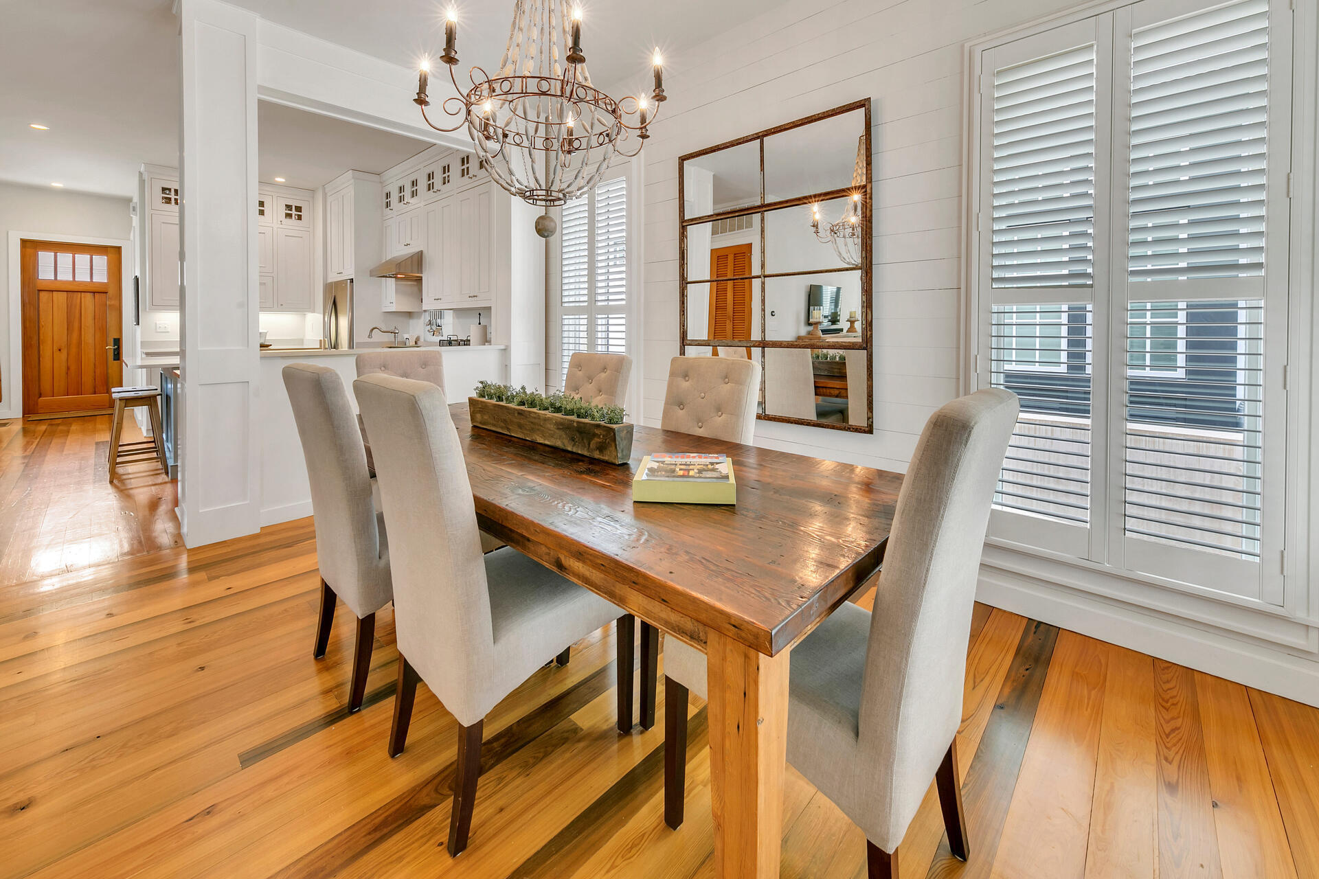 204 East Water Street Inlet Beach, FL 32461 - Photo 3 of 57 a view of a dining room with furniture and wooden floor