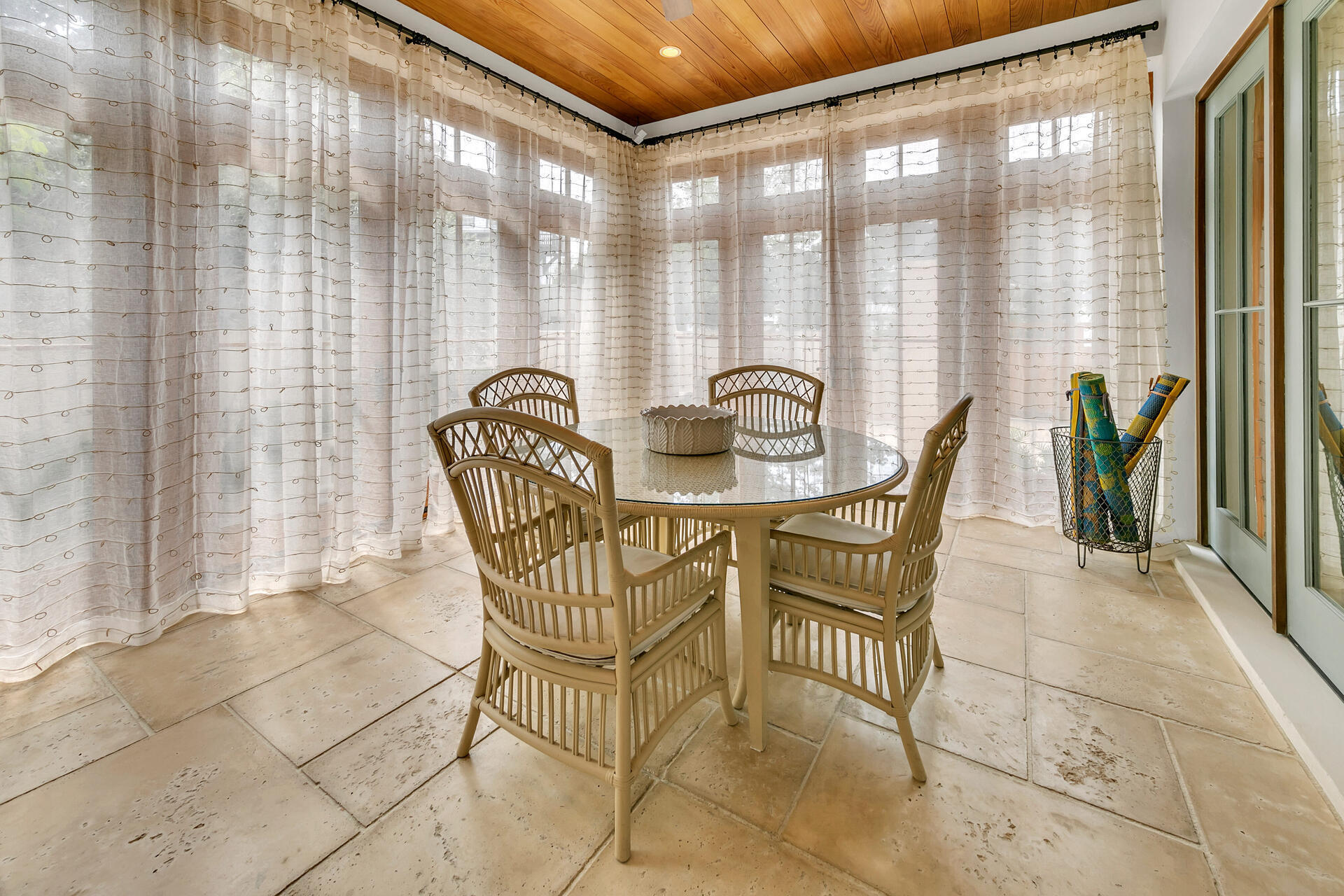 204 East Water Street Inlet Beach, FL 32461 - Photo 10 of 57 a dining room with furniture and a floor to ceiling window