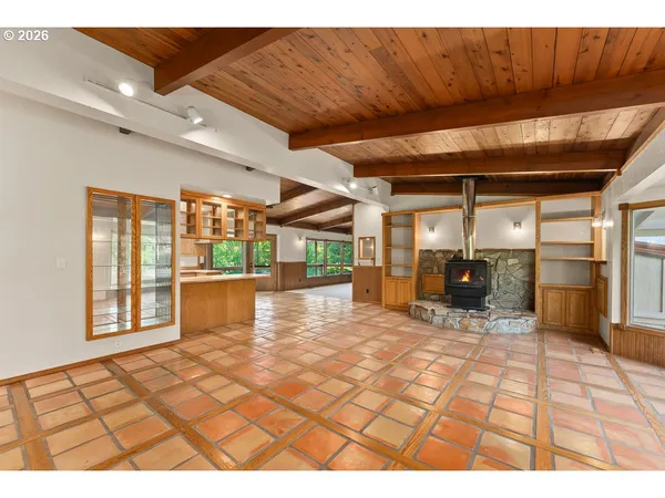 a view of a porch with wooden floor