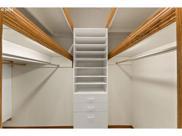 a view of an empty walk in closet