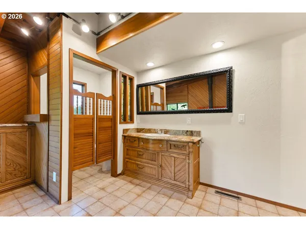 a bathroom with a large window
