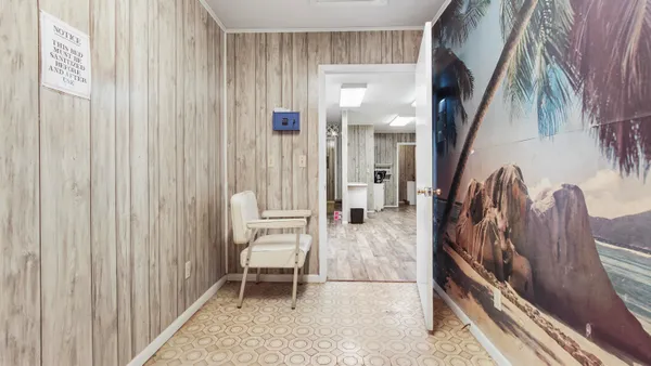 an aerial view of residential houses and outdoor space