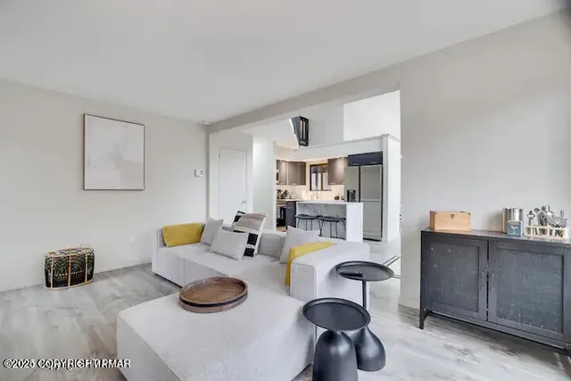 a kitchen with a sink and a stove