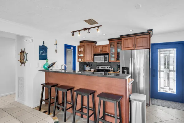 a bedroom with bed and a window