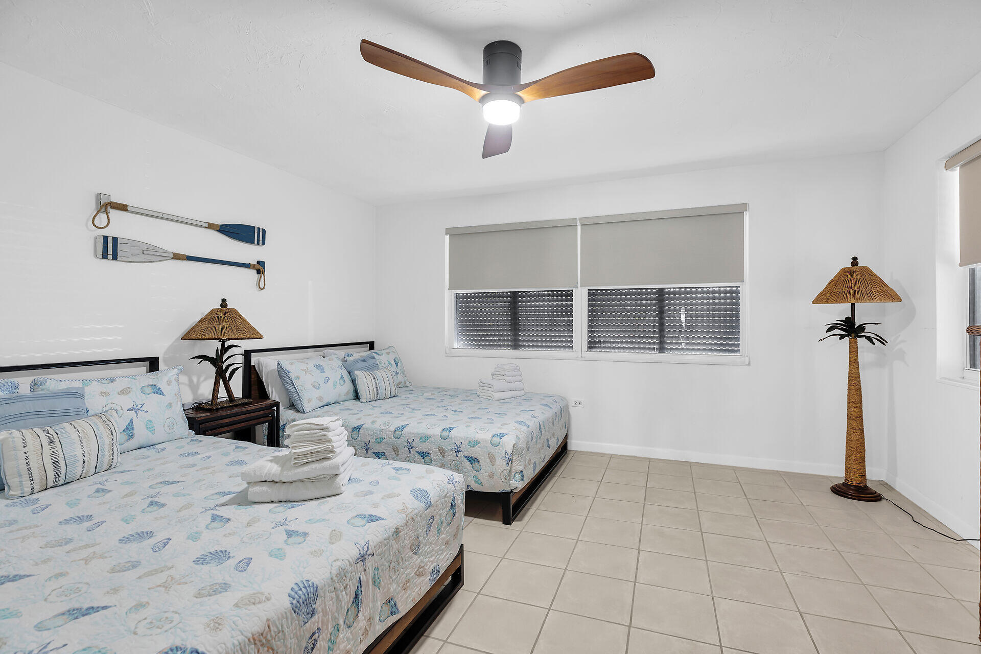 230 11th Street Key Colony Beach, FL 33051 - Photo 28 of 44 a bedroom with bed and a window