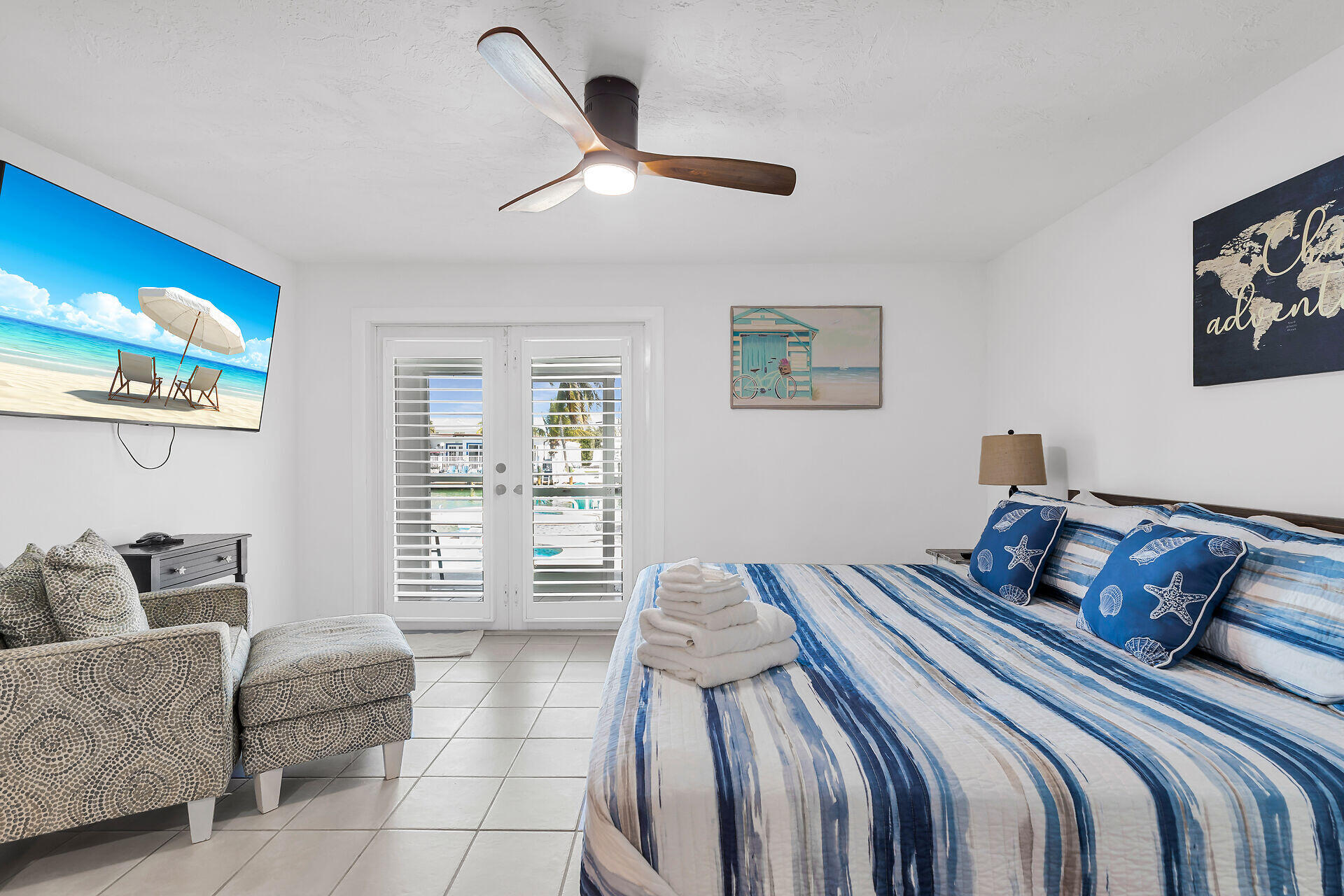 230 11th Street Key Colony Beach, FL 33051 - Photo 34 of 44 a bedroom with a bed and couch