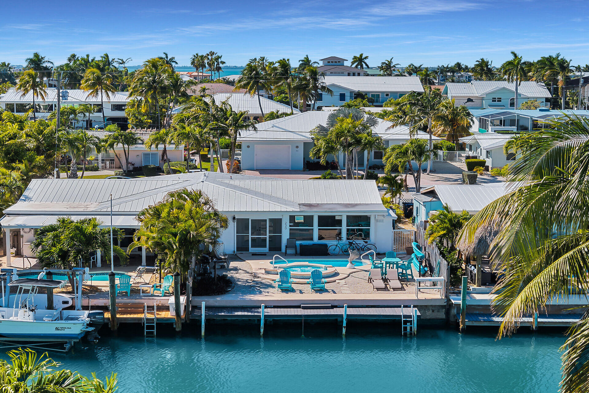 230 11th Street Key Colony Beach, FL 33051 - Photo 8 of 44 a view of a lake with houses