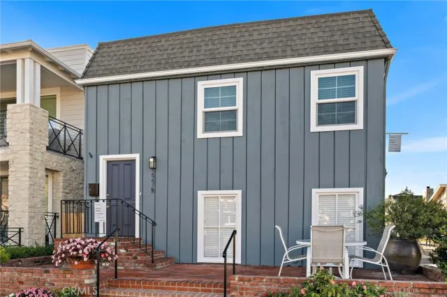 a front view of a house with street