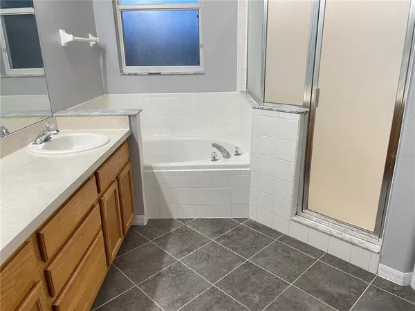 a bathroom with a sink and a bathtub