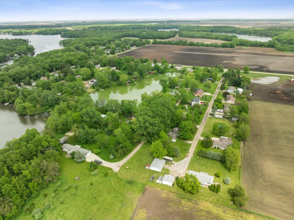 17318 Air Strip Road Hudson, IL 61748 - Photo 11 of 11 a view of lake with houses