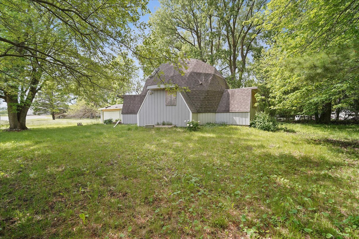 17318 Air Strip Road Hudson, IL 61748 - Photo 3 of 11 a view of a house with a yard