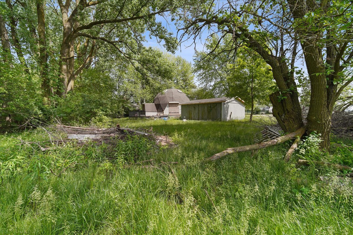 17318 Air Strip Road Hudson, IL 61748 - Photo 4 of 11 a view of a house with a yard