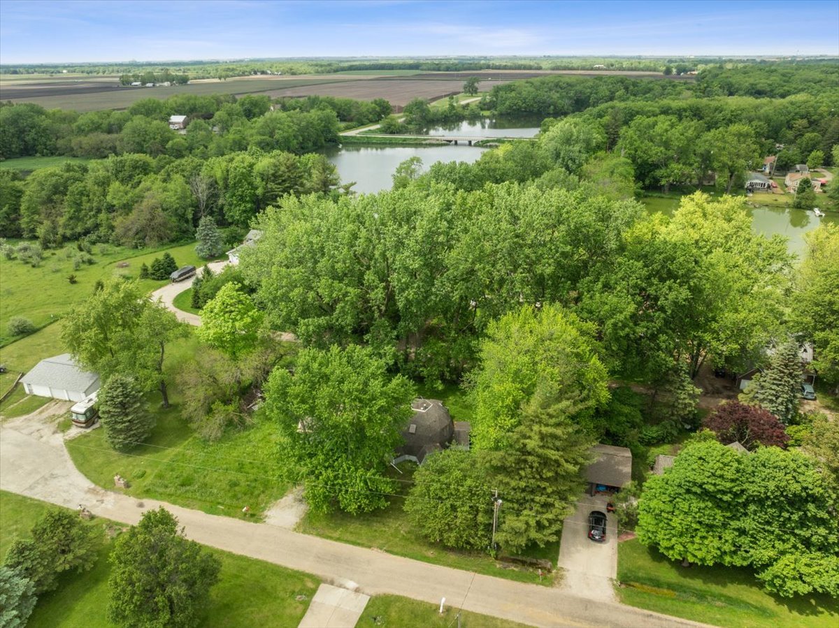 17318 Air Strip Road Hudson, IL 61748 - Photo 7 of 11 a view of a lush green forest with lots of trees