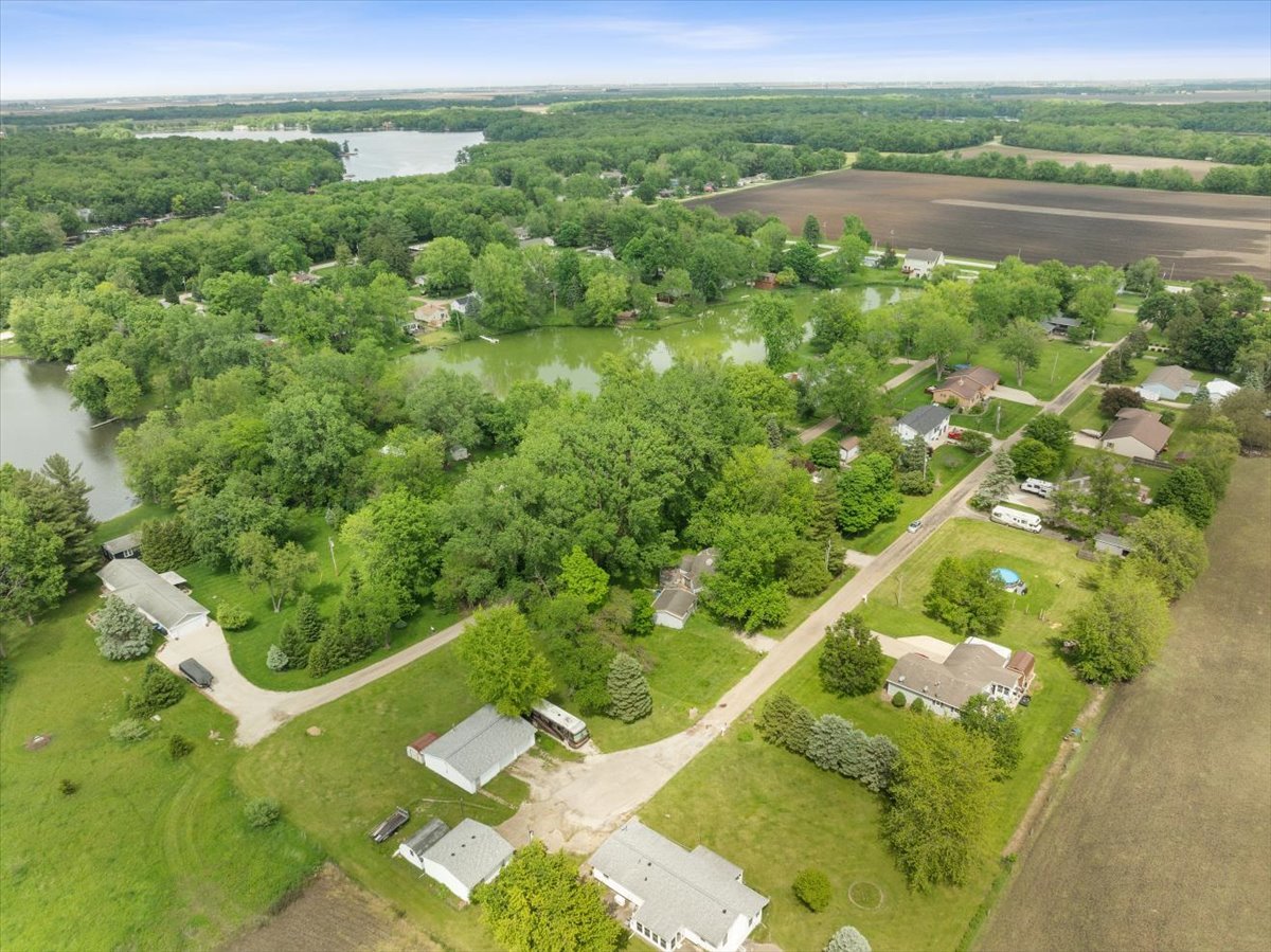 17318 Air Strip Road Hudson, IL 61748 - Photo 8 of 11 a view of a lake from a balcony