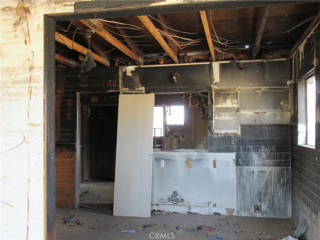 64654 Sun Mesa Road Joshua Tree, CA 92252 - Photo 7 of 25 a close view of water heater room