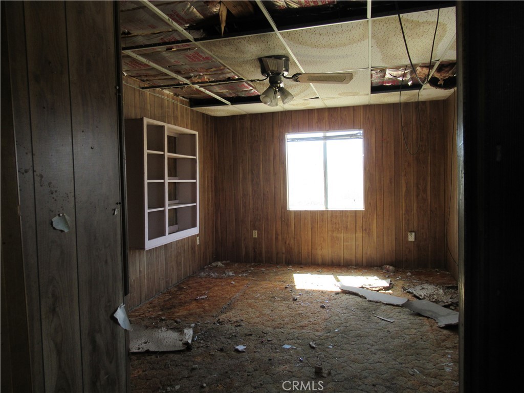 64654 Sun Mesa Road Joshua Tree, CA 92252 - Photo 10 of 25 a view of empty room with windows