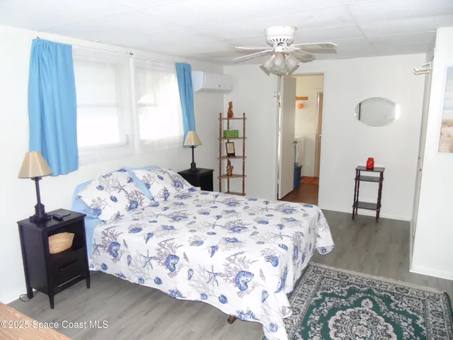 a bathroom with a sink a mirror and a shower