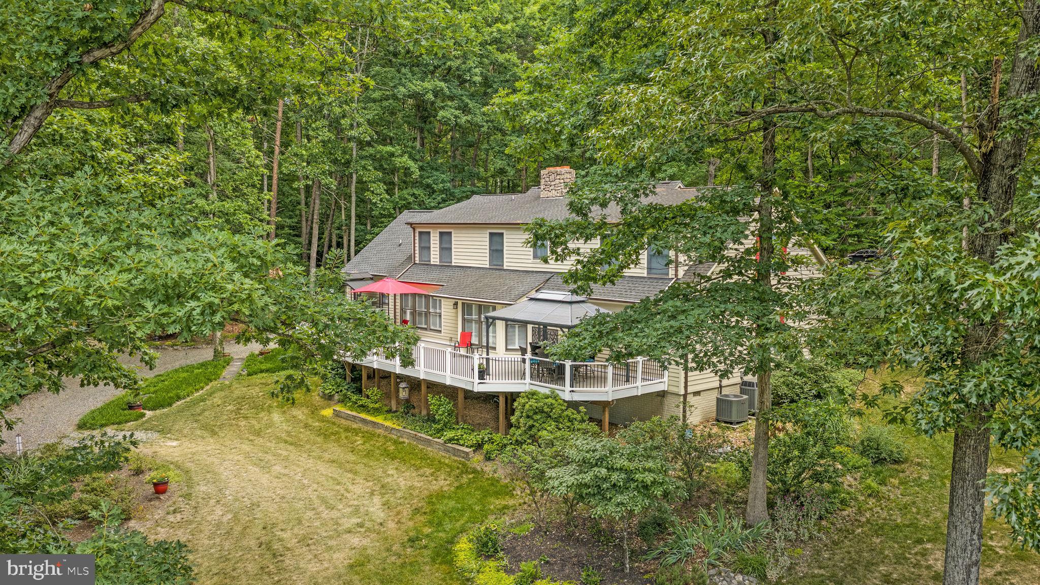 11105 Waddell Road Bumpass, VA 23024 - Photo 2 of 76 a house view with a garden space