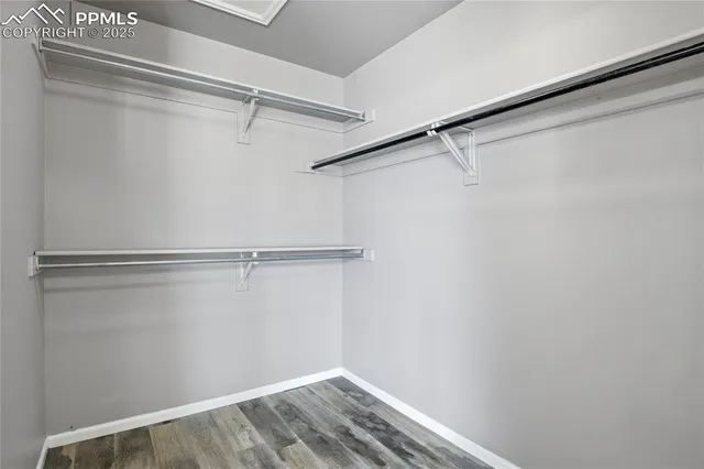 a view of a room with racks on the wall