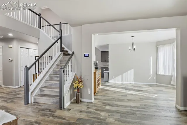 a view of a hallway with staircase
