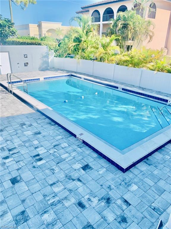 826 Wiggins Pass Road, Unit 214 Naples, FL 34110 - Photo 19 of 21 View of community pool
