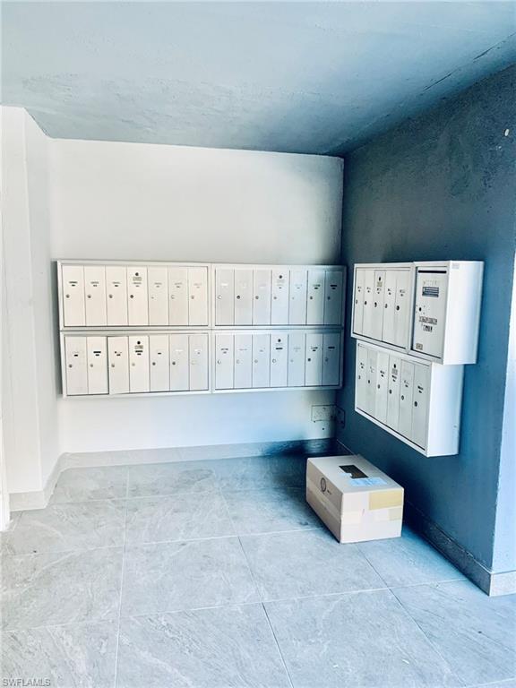 826 Wiggins Pass Road, Unit 214 Naples, FL 34110 - Photo 20 of 21 View of home's community featuring mail area