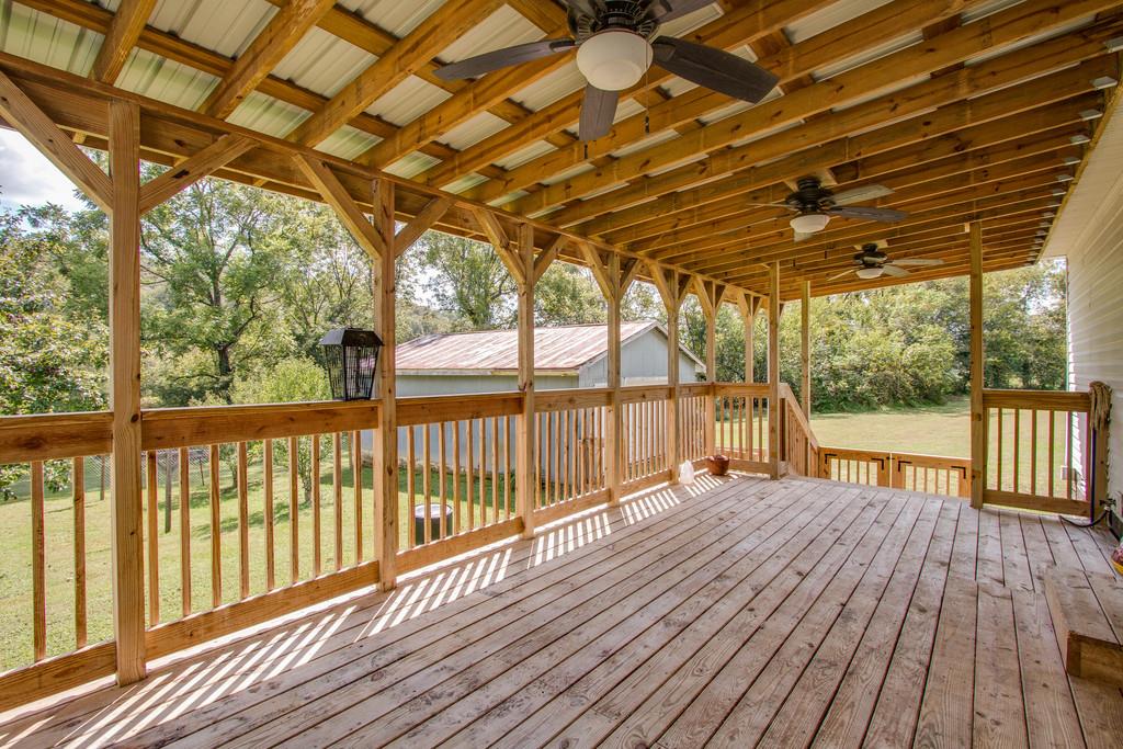 4035 Rock Springs Road Watertown, TN 37184 - Photo 23 of 26 a view of porch with wooden floor and outdoor space
