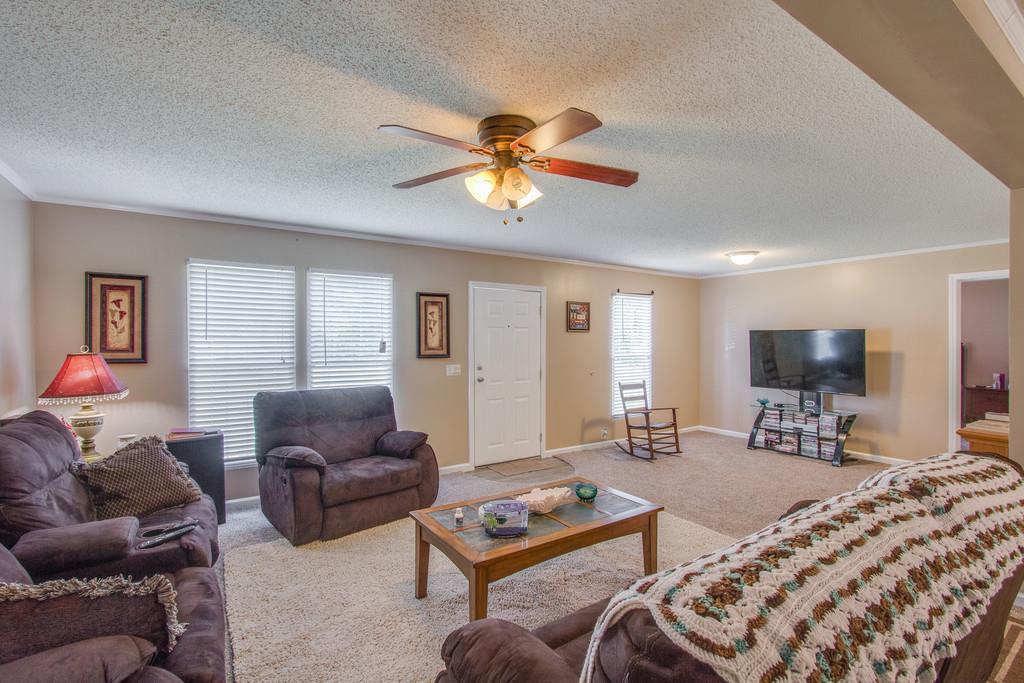 4035 Rock Springs Road Watertown, TN 37184 - Photo 6 of 26 a bedroom with furniture a ceiling fan and a window